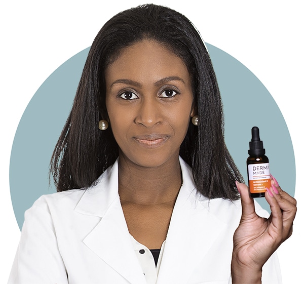 Doctor holding Antioxidant C Serum product on her hand