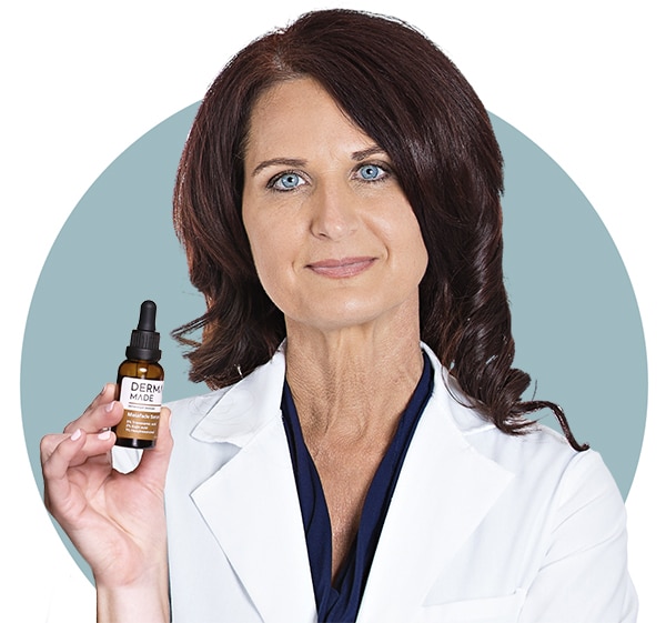 Doctor holding Antioxidant C Serum product on her hand