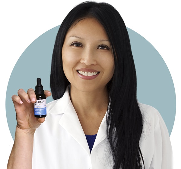 Doctor holding Retinol 0.5 product on her hand