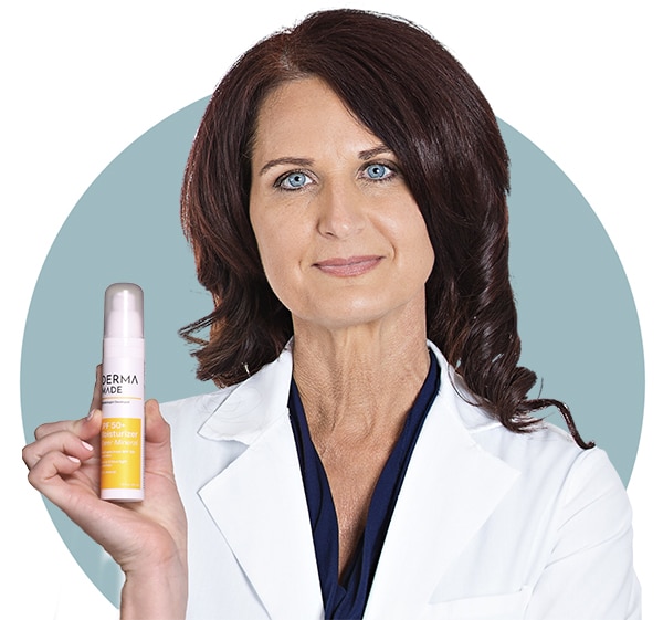 Doctor holding SPF Sheer product on her hand